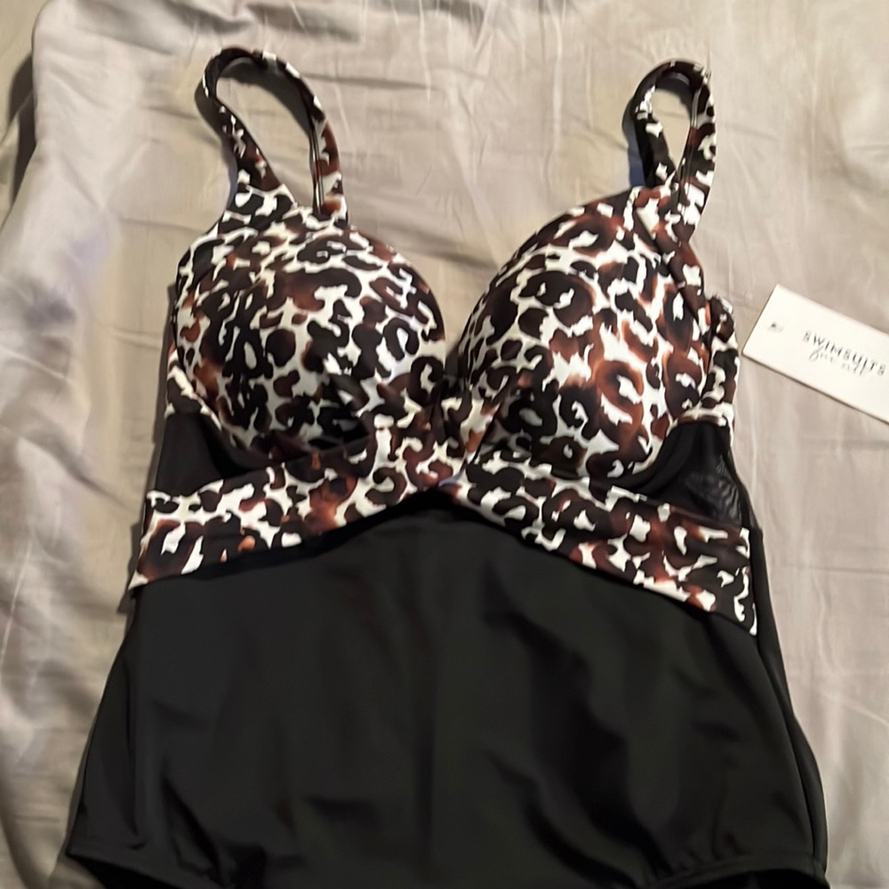 One piece swimsuit. Black and brown print.